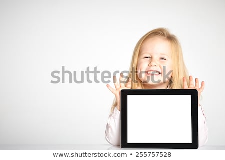 Foto stock: Girl Holding A Tablet Pc