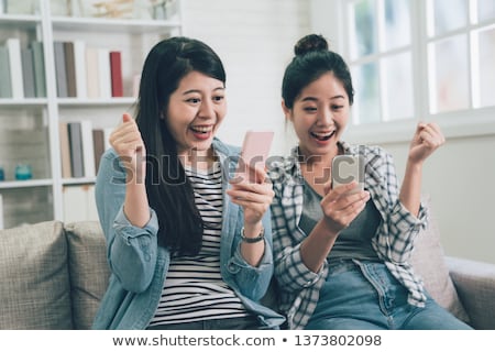 Сток-фото: Two Happy Asian Sisters