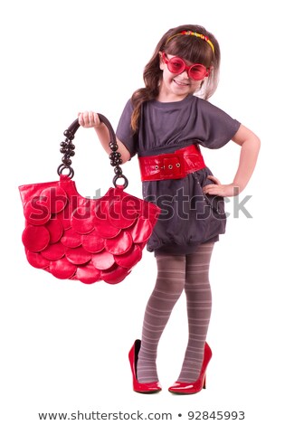 Stock foto: Little Girl Trying On A Dress With Her Mother