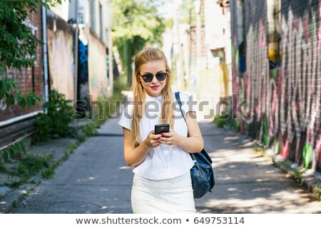Stockfoto: Young Woman In Oversized Sunglasses