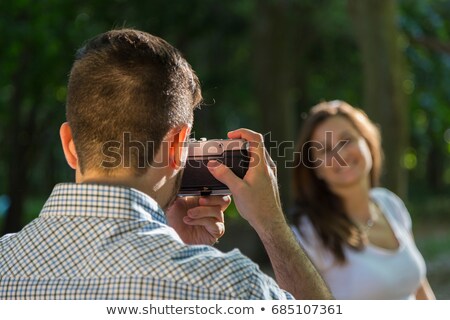 Stock foto: Man Taking A Photo Of His Girlfriend