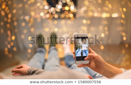 Foto d'archivio: Close Up Of Couple Taking Foot Photo By Smartphone