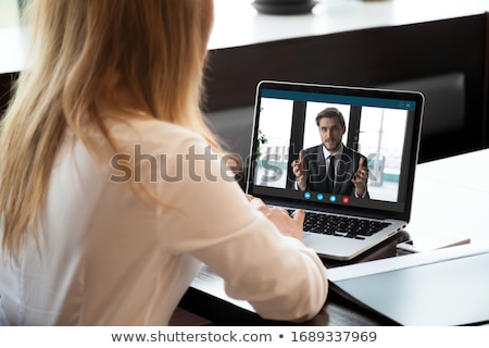 Foto stock: Employer Having Interview With Employee At Office