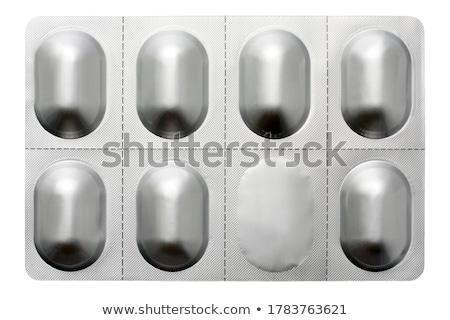 Foto stock: Pills Capsule In Plastic Strip On White Background Antibiotics Vitamins Painkiller