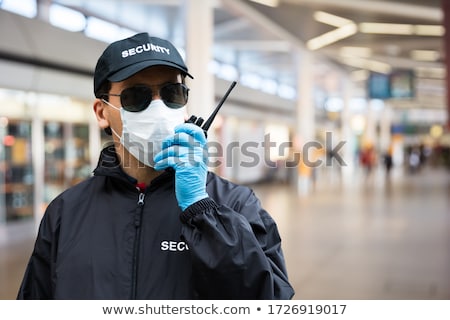 Zdjęcia stock: Security Guard Standing In Face Mask