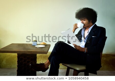 Foto stock: Portrait Of A Handsome And Young Business Man Isolated On Black Background Studio Shot