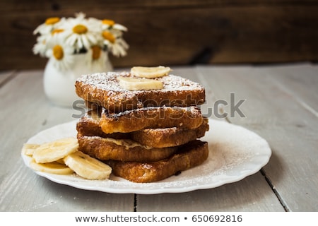 Foto stock: Chocolate Peanut Butter Banana Stuffed French Toast