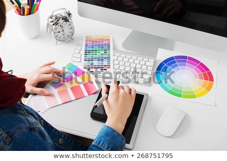 Foto d'archivio: Woman Drawing Something On Graphic Tablet At The Home Office