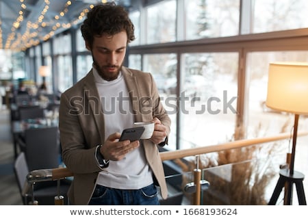 Stok fotoğraf: Businessman Texting In Free Time