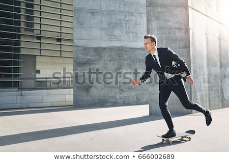 Stock fotó: Business Man On Skateboard