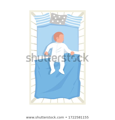 Foto stock: Newborn Baby Boy Sleeping In A Cot Top View