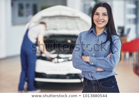 Zdjęcia stock: Auto Mechanic And Female Customer In Garage