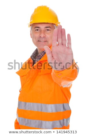 Foto d'archivio: Traffic Guard Wearing Hard Hat