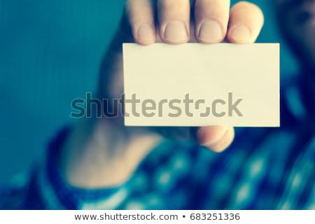 Stockfoto: Man In Suit Holding Blank Card