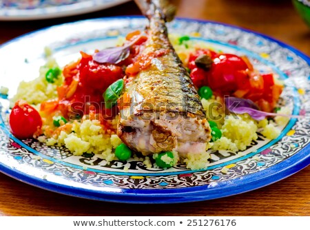 Fried Mackerel With Tomato Sauce And Couscous Foto d'archivio © zoryanchik
