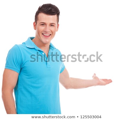 Stock photo: Young Casual Man In Polo Shirt Looking To Side