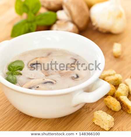 Stock photo: Creamy Mushroom Soup With Fresh Herbs Garlic Croutons