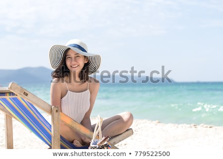 Foto stock: Portrait Of A Happy Asian Woman In Summer Hat