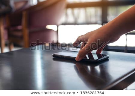 Stock fotó: Person Picking Up Lost Phone