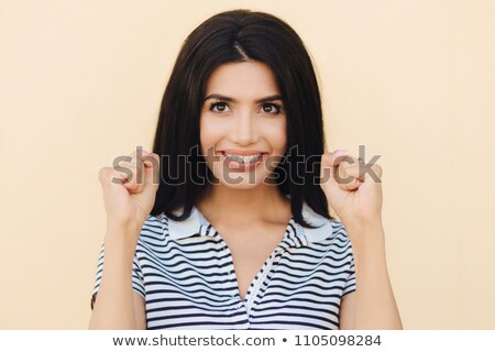 Stockfoto: Candid Shot Of Cheerful Brunette Young Female Has Big Hope Keep