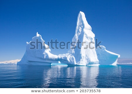 Сток-фото: Iceberg On Blue Background With White Frame