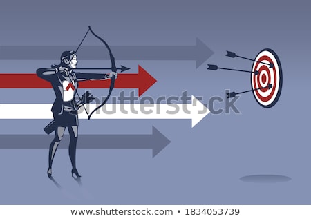 Stockfoto: Woman Ready To Shoot At The Target With A Bow And Arrow