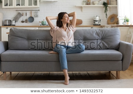 Zdjęcia stock: Beautiful Woman Sitting And Feeling Good