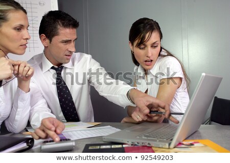 [[stock_photo]]: Disgusted Businesspeople Looking At Marketing Results