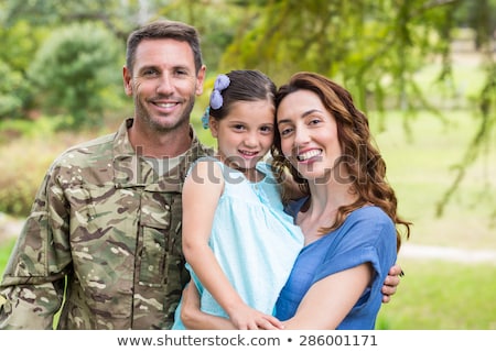Stock photo: Soldier And Two Women