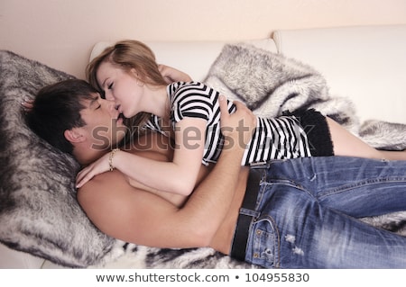 Stock fotó: Young Topless Couple Embracing In Jeans