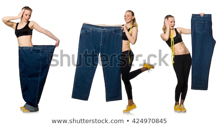 Foto d'archivio: Young Girl With Centimeter In Dieting Concept