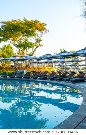 [[stock_photo]]: Chaise Lounge Or Chair In Swimming Pool