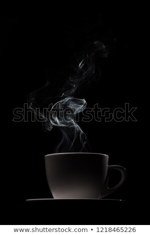 Foto stock: A Coffee Mug With Croissants On A Dark Background