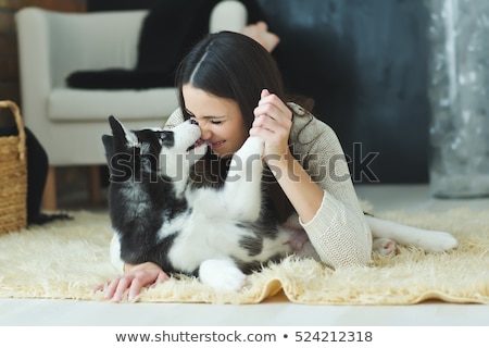 Foto stock: Woman With Husky