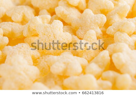 ストックフォト: Yellow Stars Corn Flakes Closeup Background Cereals Texture Top View