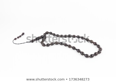 Foto stock: Rosary On A White Background