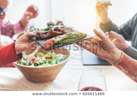 Foto d'archivio: Woman Eating Healthy Food And Drinking Wine