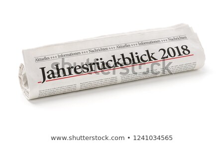 Zwinięta niemiecka gazeta Zdjęcia stock © Zerbor