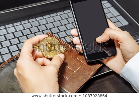 ストックフォト: Close Up Of Hand With Smartphone And Bitcoin