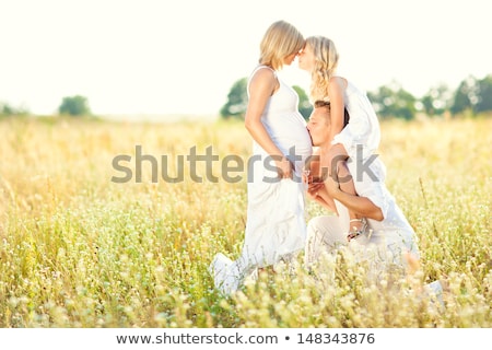 Stockfoto: Pregnant Mother And Her Daughter