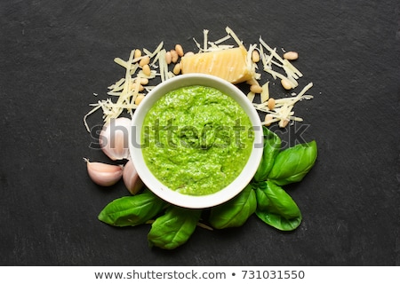 Stok fotoğraf: Cheese With Pesto Sauce And Nuts