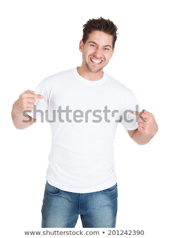Foto stock: Smiling Young Man Pointing Itself
