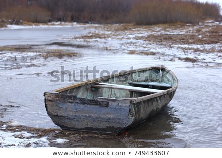 Stock photo: Rowing Boat In A Frozen River
