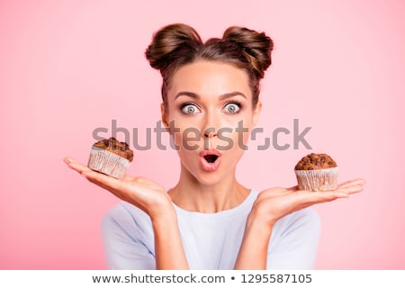 ストックフォト: Close Up Portrait Of A Funny Pretty Girl Holding Donuts