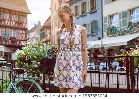 Stockfoto: Woman Tourist Visiting The Town Of Colmar Alsace France