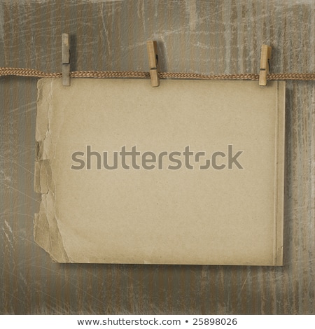 Stockfoto: Old Paper Are Hanging In The Row On The Striped Background