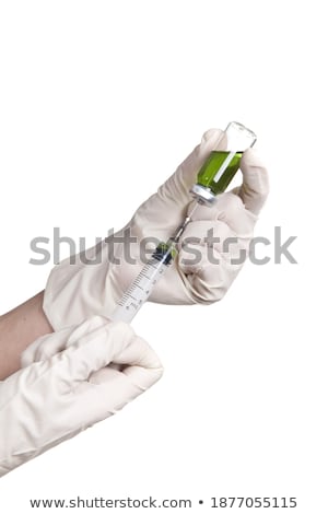 [[stock_photo]]: Man Gaining The Liquid In The Syringe