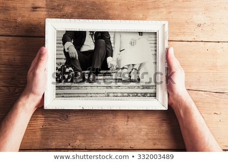 Foto d'archivio: Loving Couple In Picture Frame