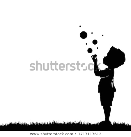 Stock fotó: Boy Blowing Bubbles