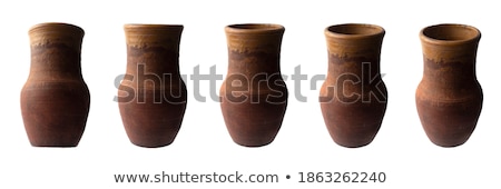 Foto stock: Pepper And Old Clay Jug